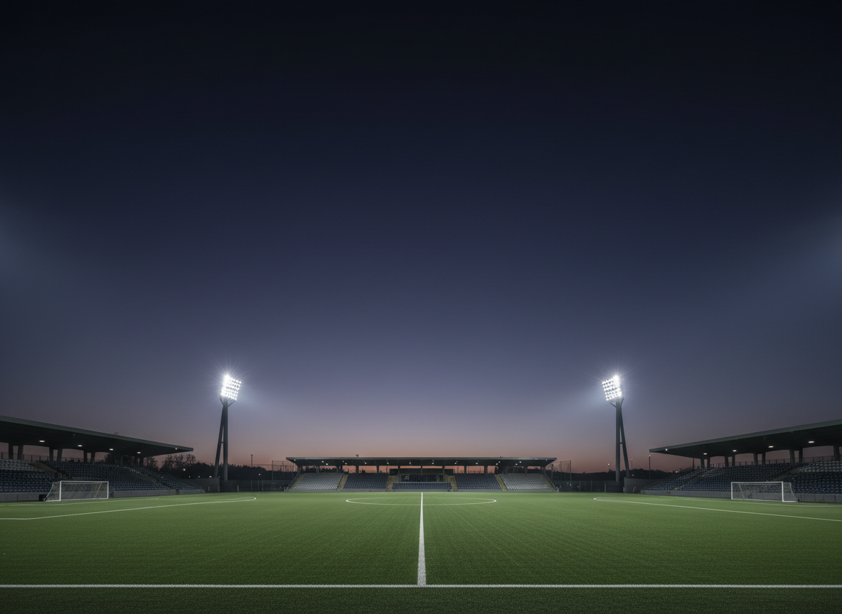 Evening soccer field under stadium lights